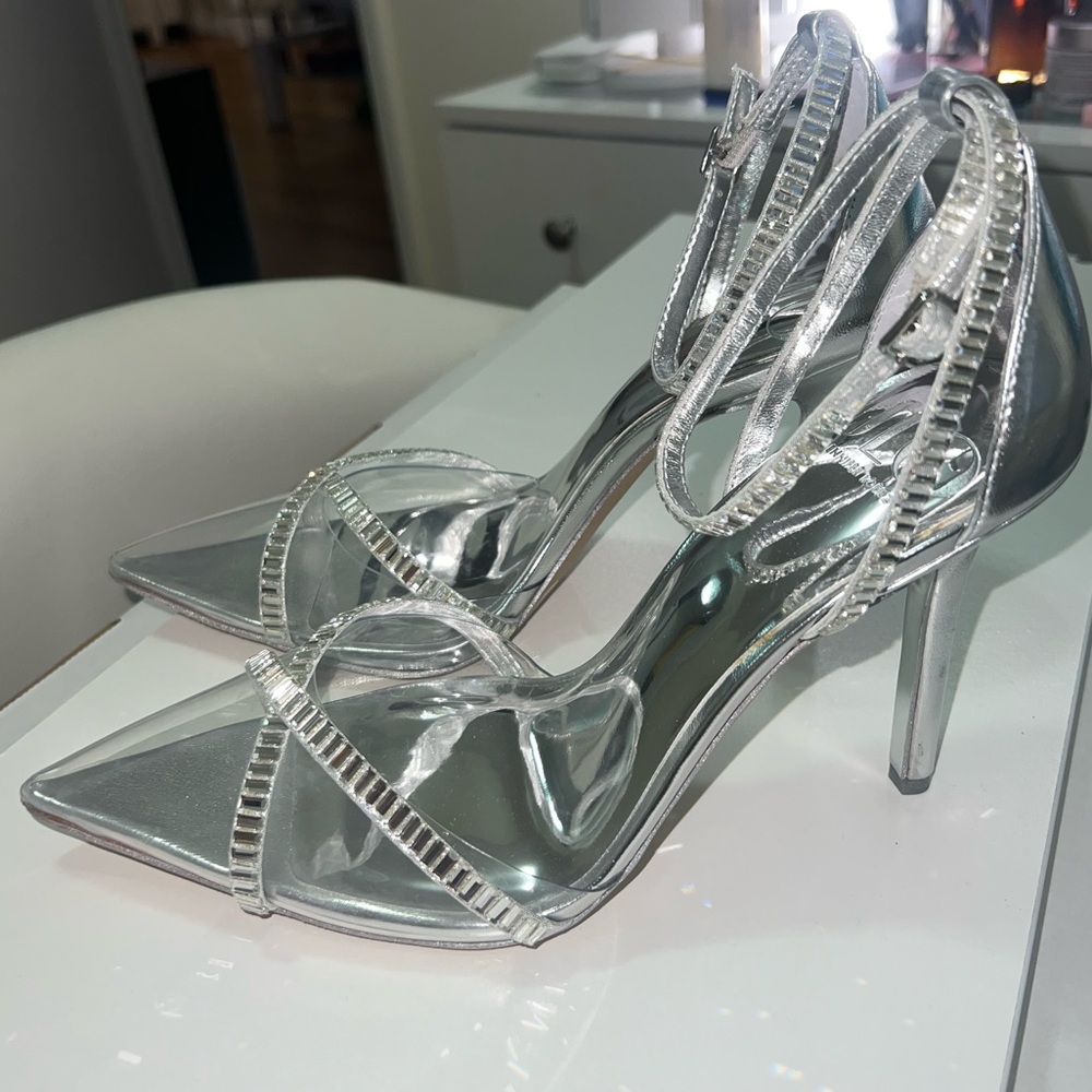 Jlo silver Pumps
